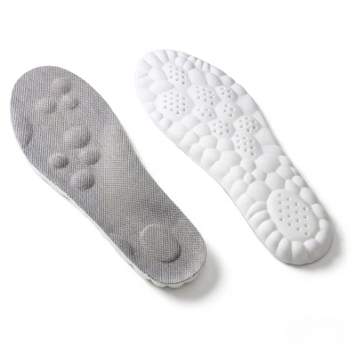 FootRelief™ ortopediske innleggssåler, par – grå overflate med massasjepunkter og hvit dempende side for hæl og fotbue
