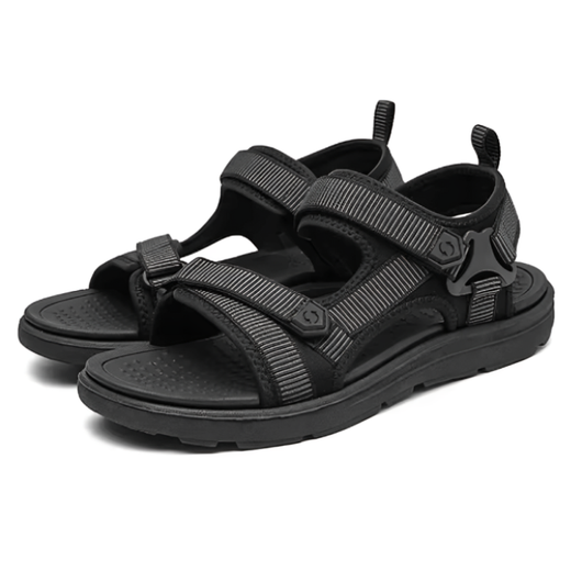 Produktbilde av støtdempende sandaler i grått og svart med tre justerbare stropper og profilerte såler, mot hvit bakgrunn